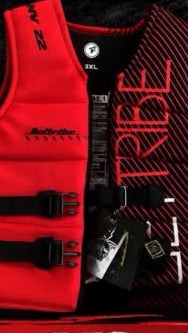 Promotional graphic for Jettribe vests showing three color options: a neon yellow vest labeled 'YELLOW SIZE XL', a black carbon-fiber pattern vest labeled 'BLACK', and a red vest labeled 'RED SIZES 2XL & 3XL'. Large text reads 'VEST IN STOCK!' and '$220 EACH'.